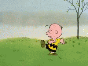 Charlie Brown attempts to kick the football, but Lucy pulls it away causing him to fall on his back - a never-ending trick.