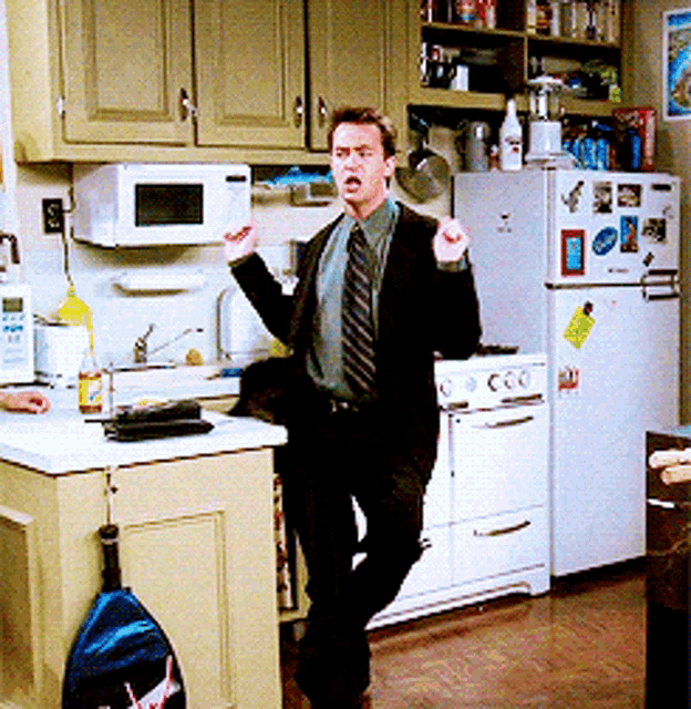 Chandler Bing from Friends awkwardly dancing
