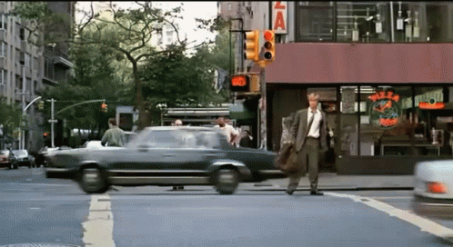 Brad Pitt's character getting hit by multiple cars