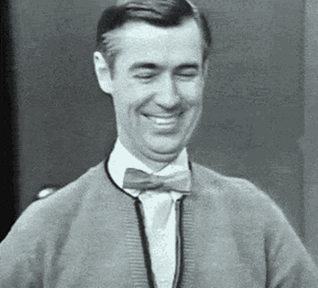 Mr. Rogers raising his middle finger to express frustration. 